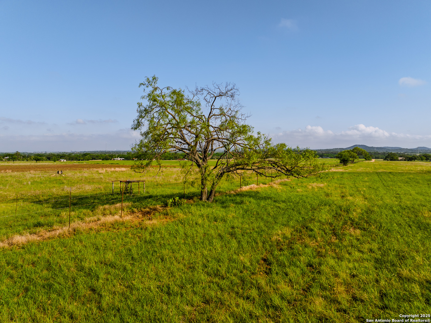 Lot4 Oak Mott Road Comfort, TX 78013 - Photo 4 of 21 a view of a lake with a building in the background