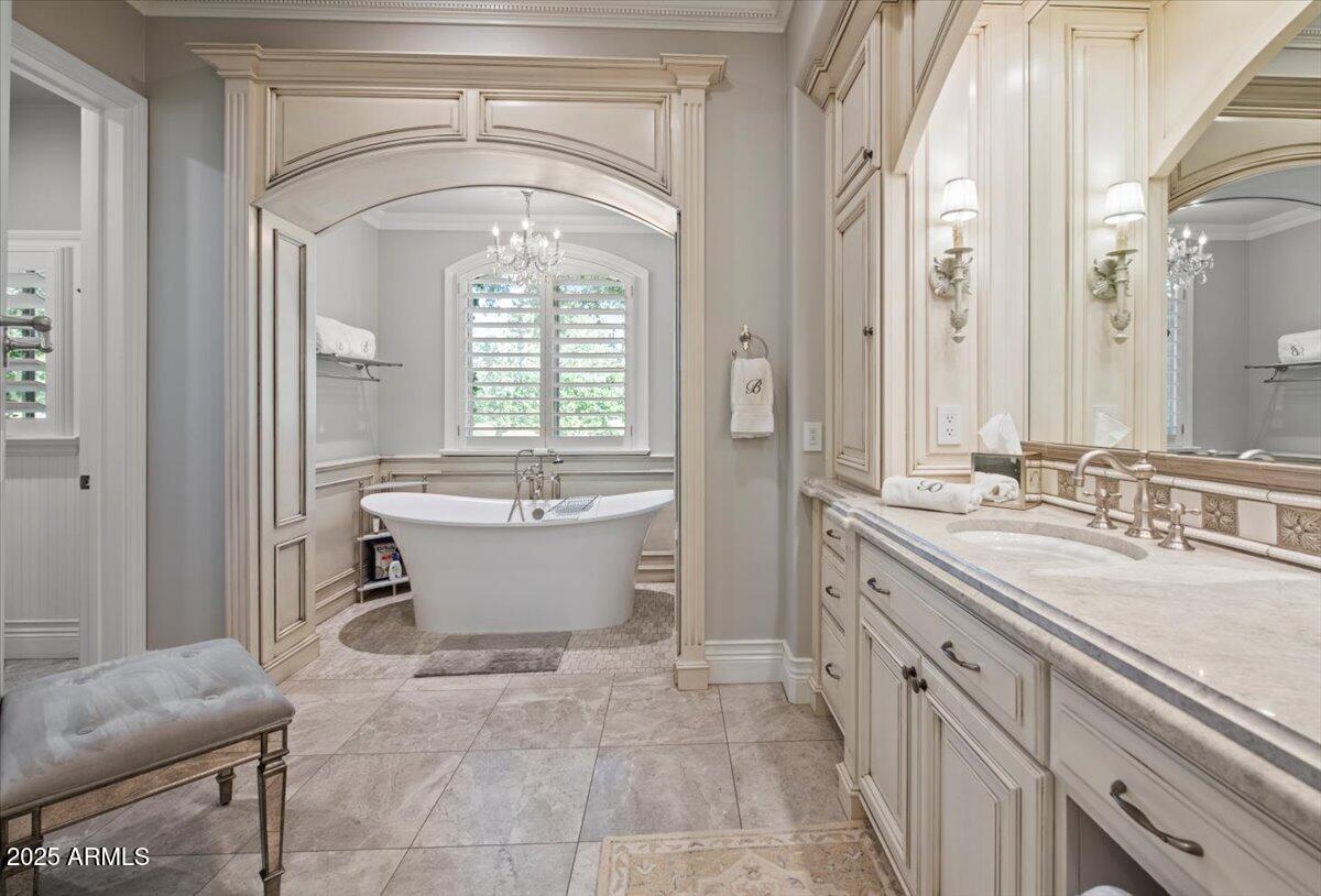2205 East Colter Street Phoenix, AZ 85016 - Photo 23 of 59 a spacious bathroom with a tub sink and mirror