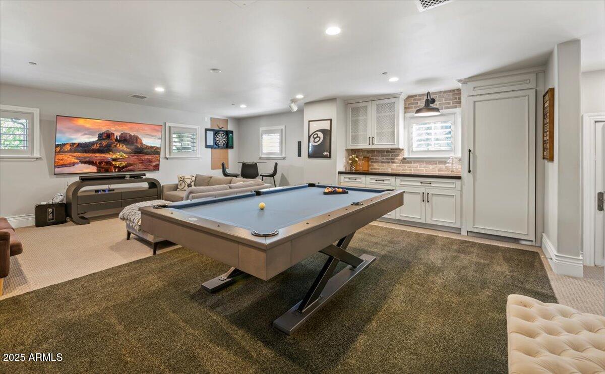 2205 East Colter Street Phoenix, AZ 85016 - Photo 36 of 59 a room with furniture pool table flat screen tv and windows