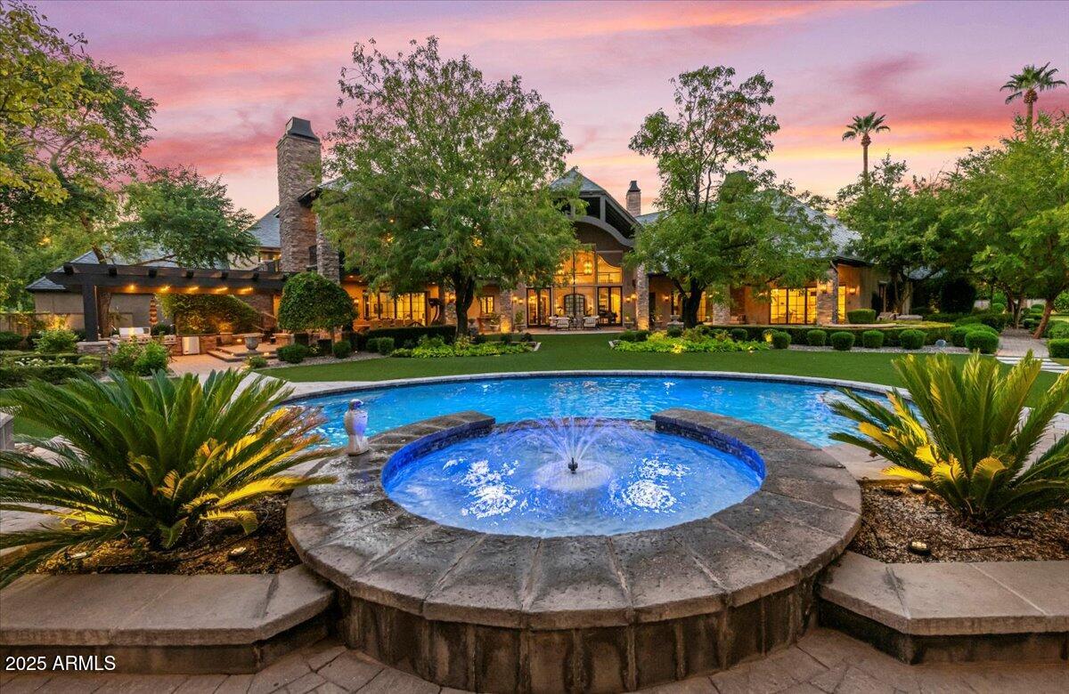 2205 East Colter Street Phoenix, AZ 85016 - Photo 45 of 59 a view of a swimming pool with a patio and plants