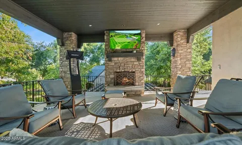 a view of a garden with a building in the background