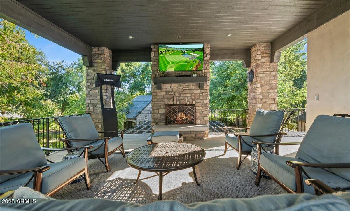 2205 East Colter Street Phoenix, AZ 85016 - Photo 49 of 59 a view of a patio with table and chairs and potted plants