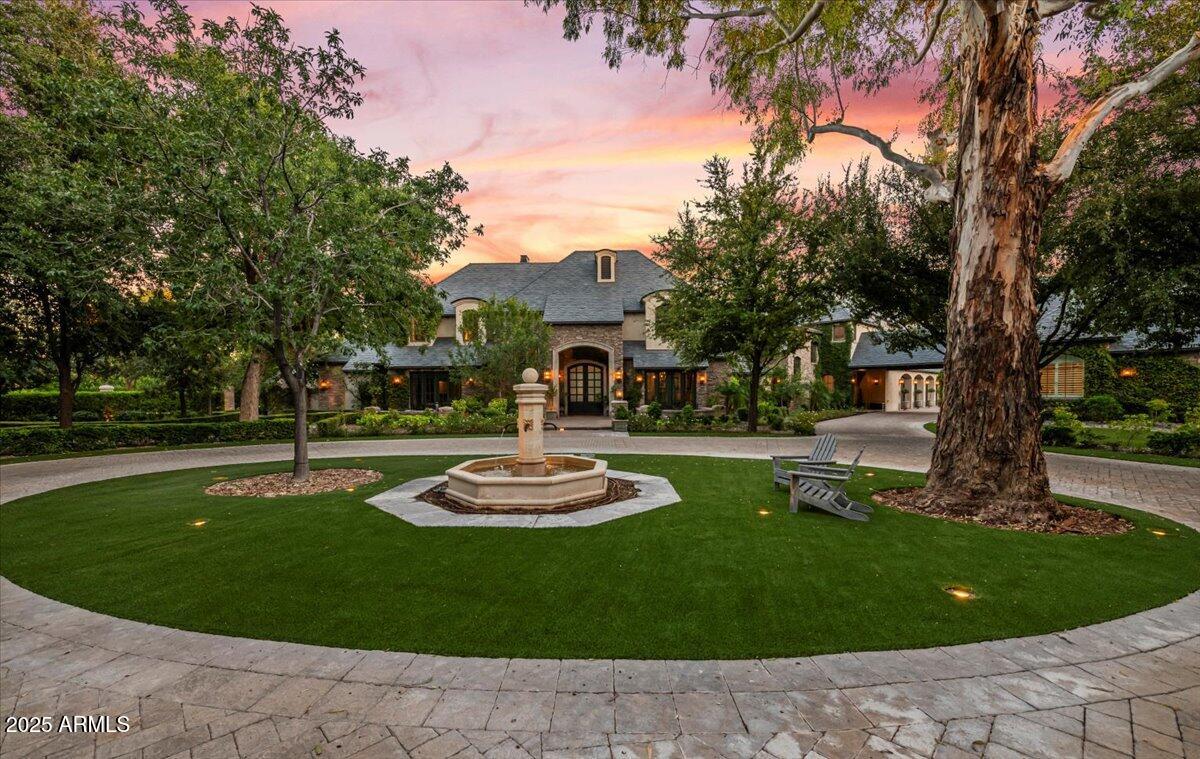 2205 East Colter Street Phoenix, AZ 85016 - Photo 4 of 59 a view of a house with garden and trees