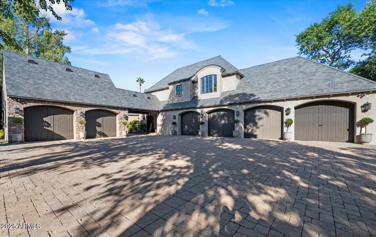 2205 East Colter Street Phoenix, AZ 85016 - Photo 6 of 59 a front view of a house with a yard