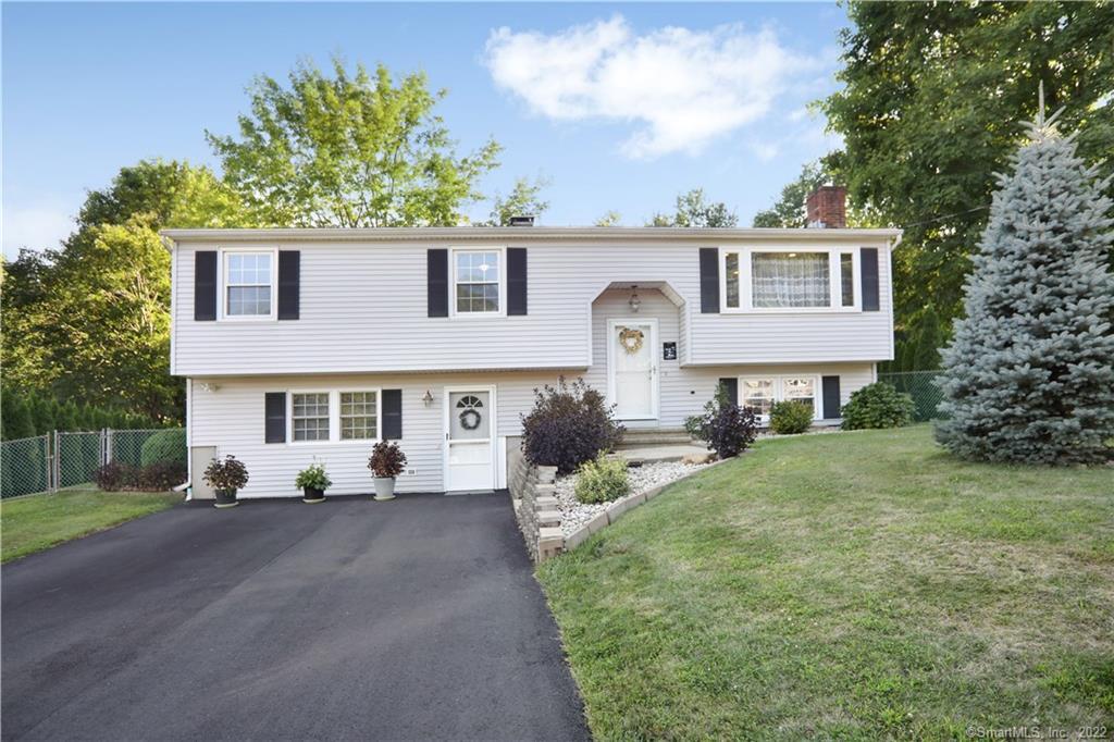 9 Cornwell Road Wallingford, CT 06492 - Photo 1 of 1 a front view of a house with garden