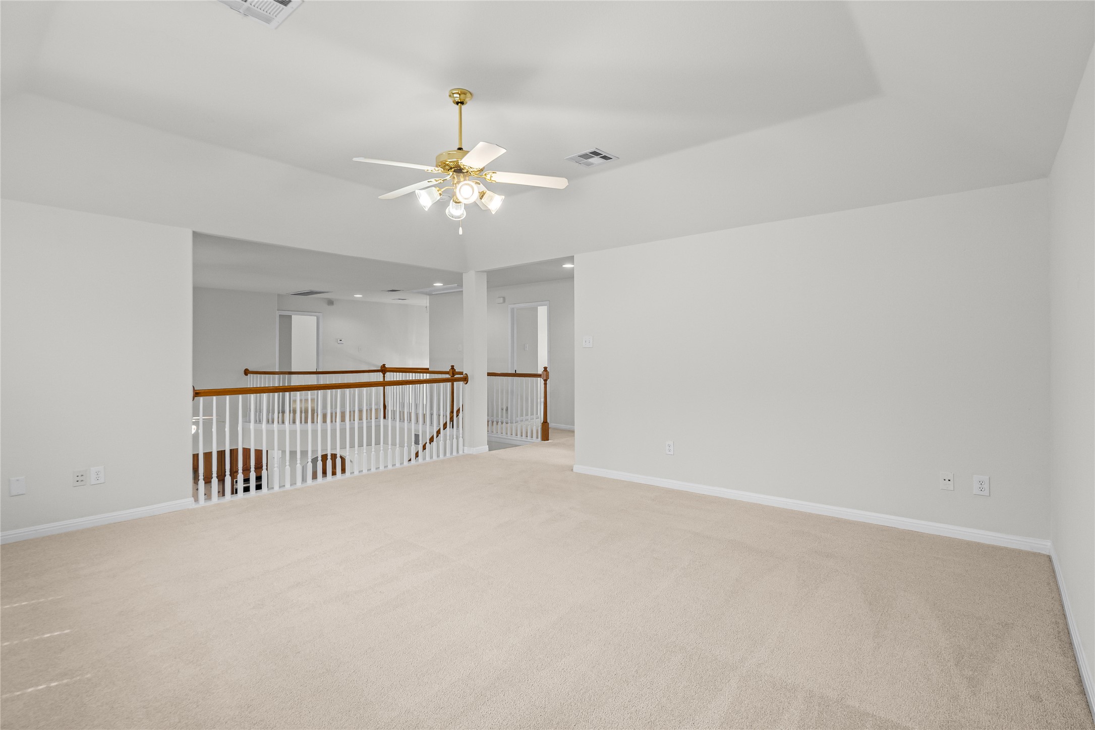10700 Pointe View Drive Austin, TX 78738 - Photo 19 of 35 A spacious carpeted loft area provides an ideal flexible living space.