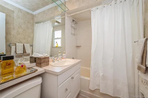 a kitchen with stainless steel appliances granite countertop a refrigerator a stove and a sink