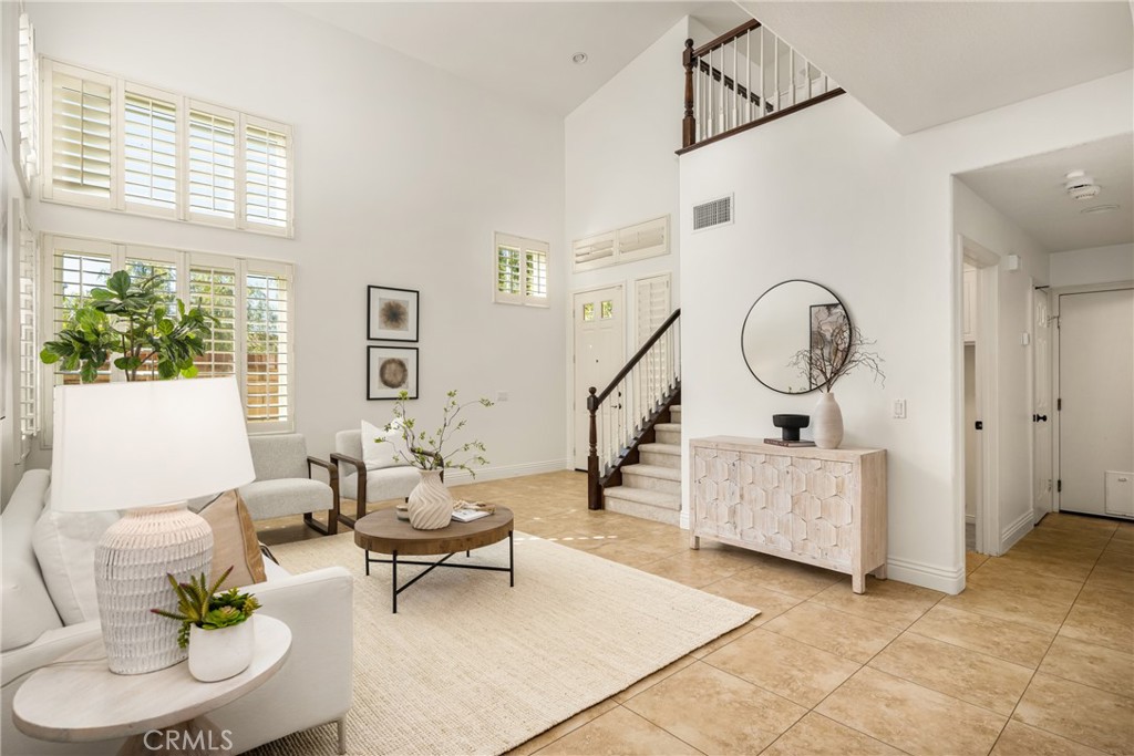 10970 Hiskey Lane Tustin, CA 92782 - Photo 14 of 60 a living room with fireplace furniture and a window