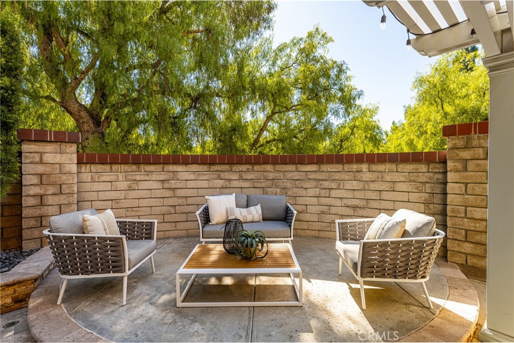 10970 Hiskey Lane Tustin, CA 92782 - Photo 29 of 60 a view of a patio with two chairs and a couch