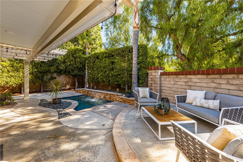 10970 Hiskey Lane Tustin, CA 92782 - Photo 30 of 60 a view of swimming pool with chairs and couch