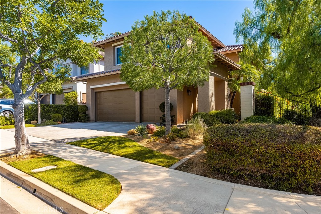 10970 Hiskey Lane Tustin, CA 92782 - Photo 3 of 60 a front view of house with yard