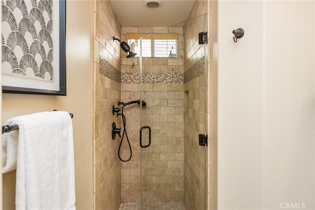 10970 Hiskey Lane Tustin, CA 92782 - Photo 37 of 60 a bathroom with a shower