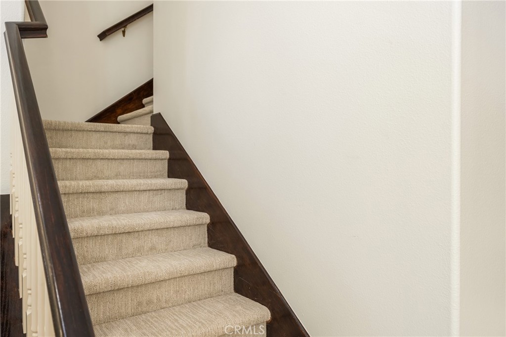 10970 Hiskey Lane Tustin, CA 92782 - Photo 38 of 60 a view of staircase with white walls and white door