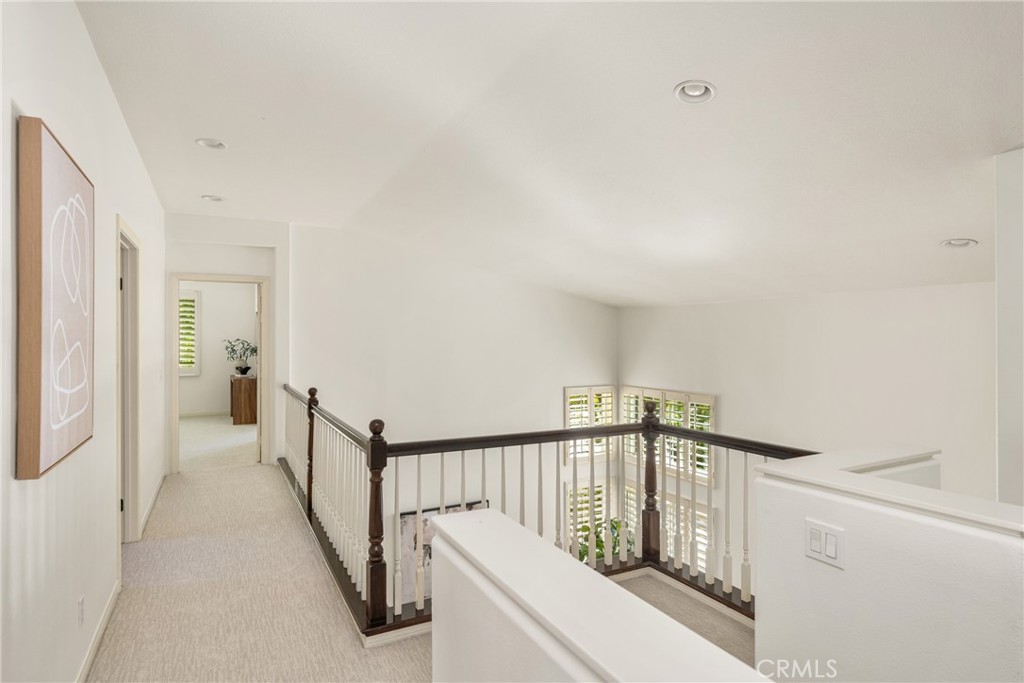 10970 Hiskey Lane Tustin, CA 92782 - Photo 39 of 60 a view of staircase with railing and white walls