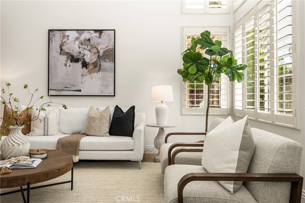 10970 Hiskey Lane Tustin, CA 92782 - Photo 5 of 60 a living room with furniture and a potted plant
