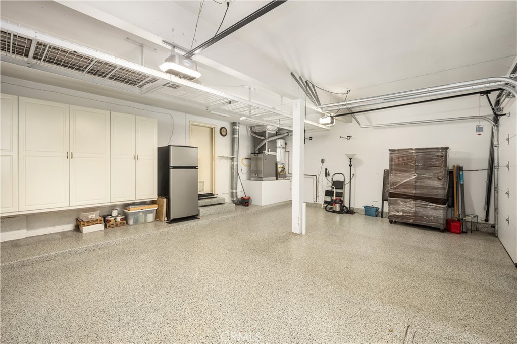 10970 Hiskey Lane Tustin, CA 92782 - Photo 55 of 60 a view of a livingroom with gym equipment and a window