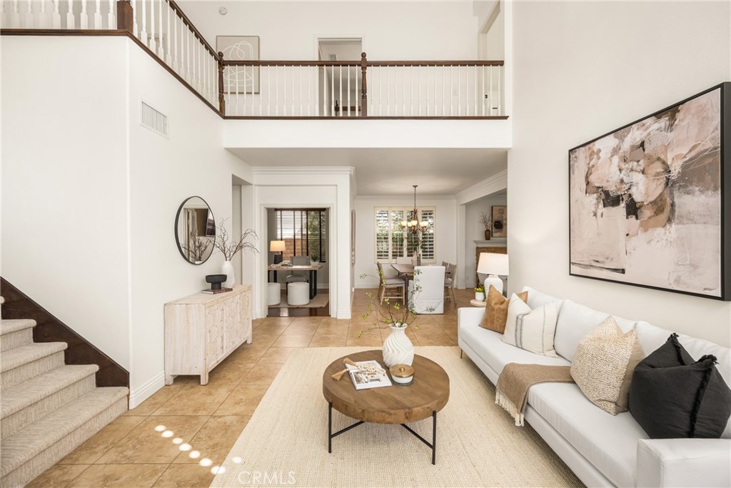 10970 Hiskey Lane Tustin, CA 92782 - Photo 6 of 60 a living room with furniture a couch and dresser with wooden floor