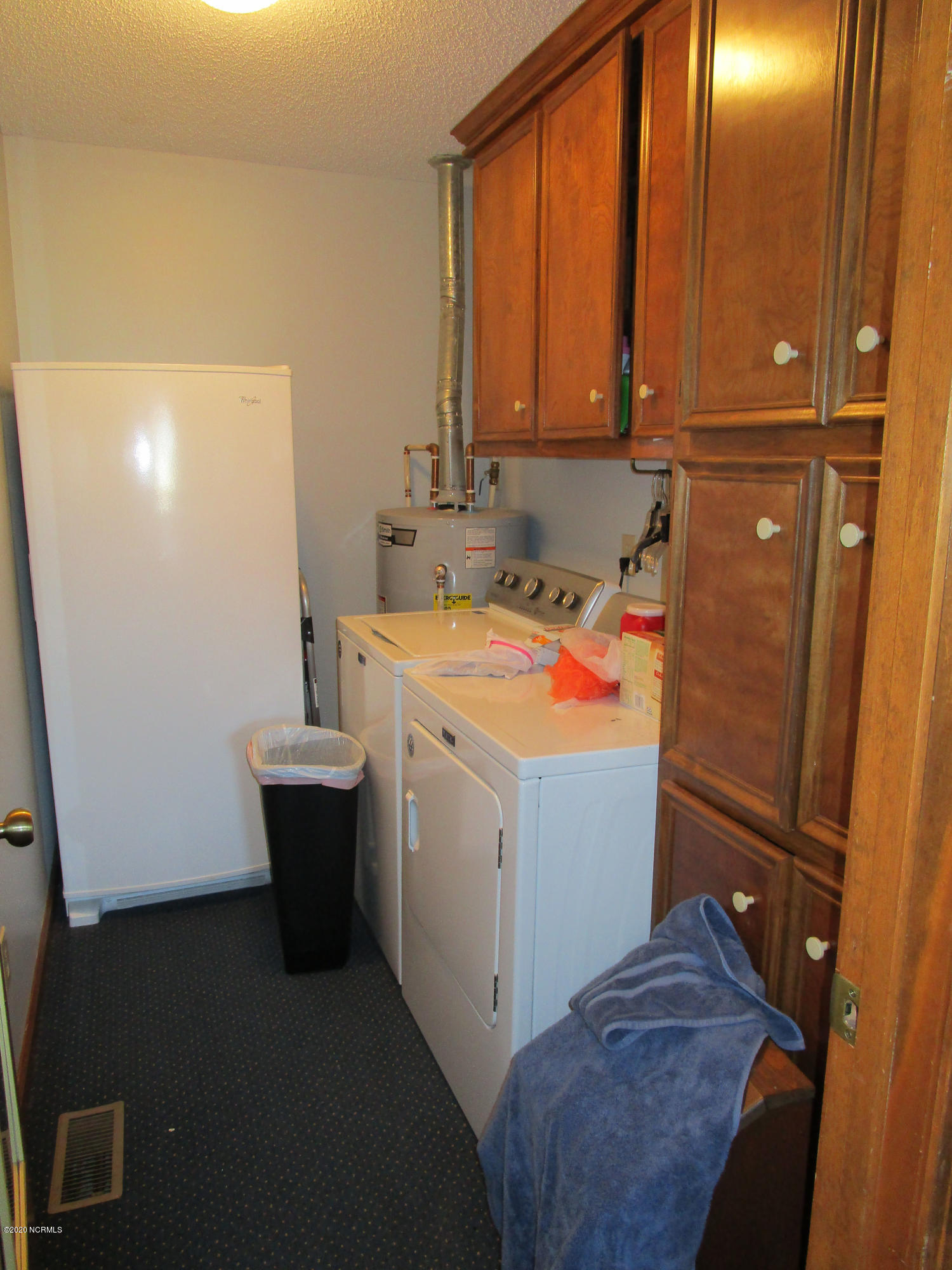 3854 Mobleys Bridge Road Grimesland, NC 27837 - Photo 11 of 15 Laundry Room with Built Ins