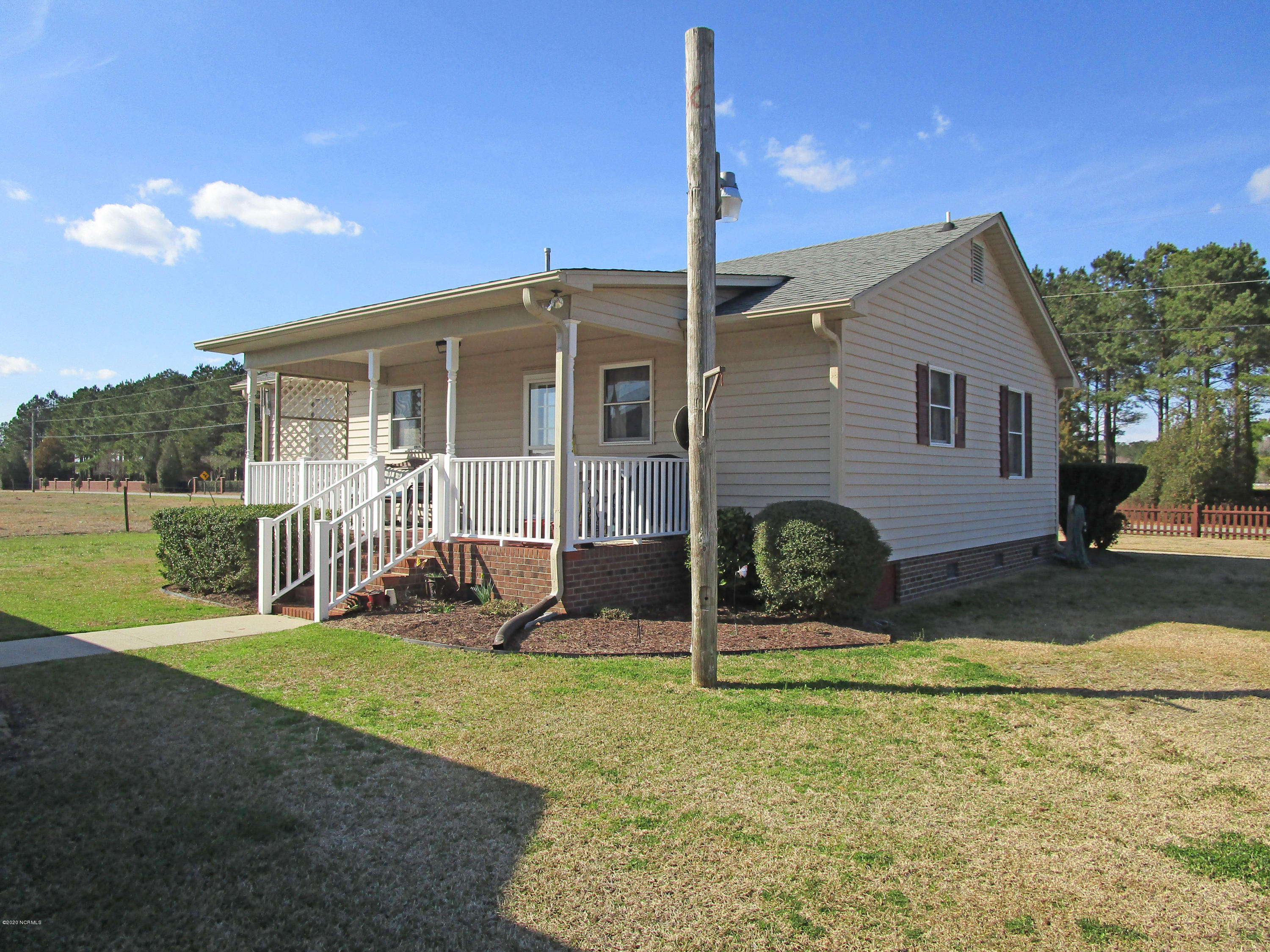 3854 Mobleys Bridge Road Grimesland, NC 27837 - Photo 12 of 15 Relaxing Back Porch