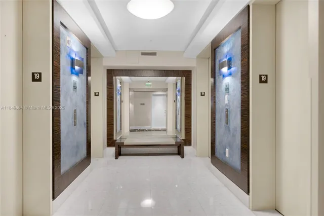 a view of a house with a swimming pool and sitting area