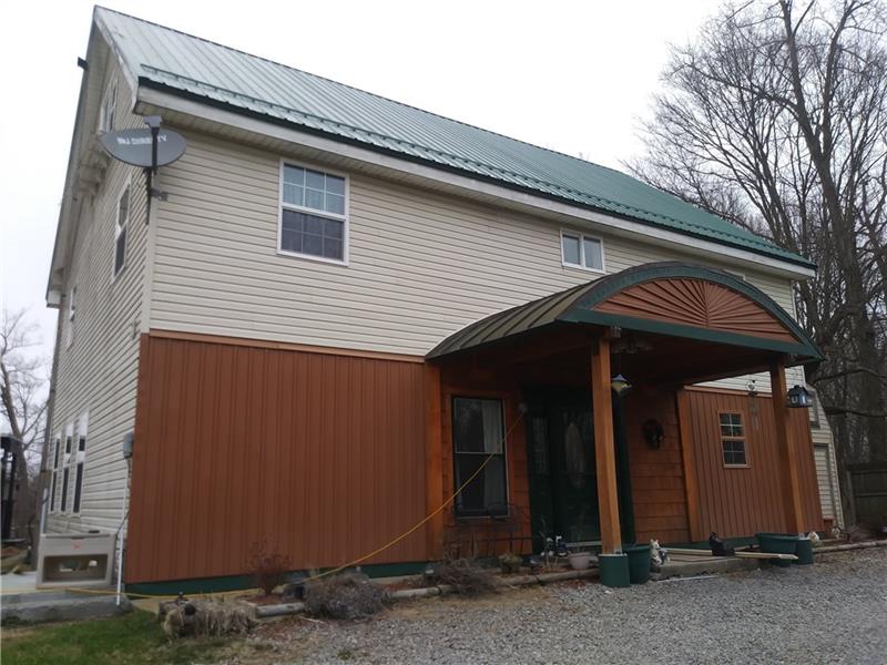 1757 Georgetown Road Volant, PA 16156 - Photo 1 of 3 Fantastic Homestead! New 2018 metal roof, portica, two-story saltbox, setback by over 300' from road, with over 15 acres!