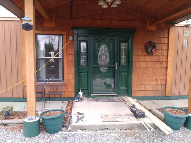 1757 Georgetown Road Volant, PA 16156 - Photo 2 of 3 Welcoming entry to this Fantastic Homestead. New 2018 metal roof, portica, two-story saltbox, setback approx. 300' from road, with over 15 acres of land!