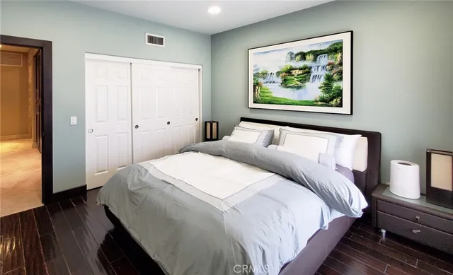 a bathroom with a sink vanity and mirror