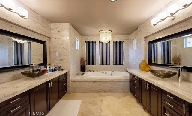 a view of a balcony with an outdoor seating