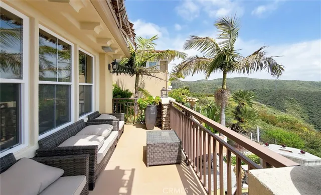 a view of an ocean and a yard