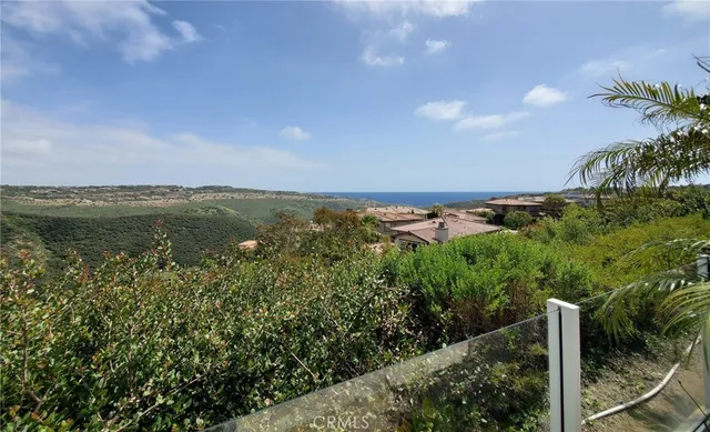 a view of a backyard with sitting area