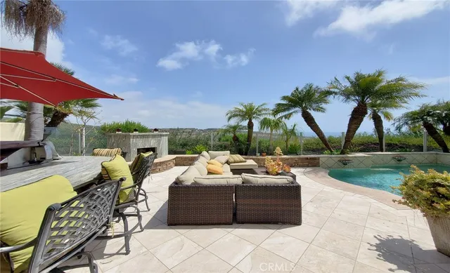 a view of yard with furniture and a garden