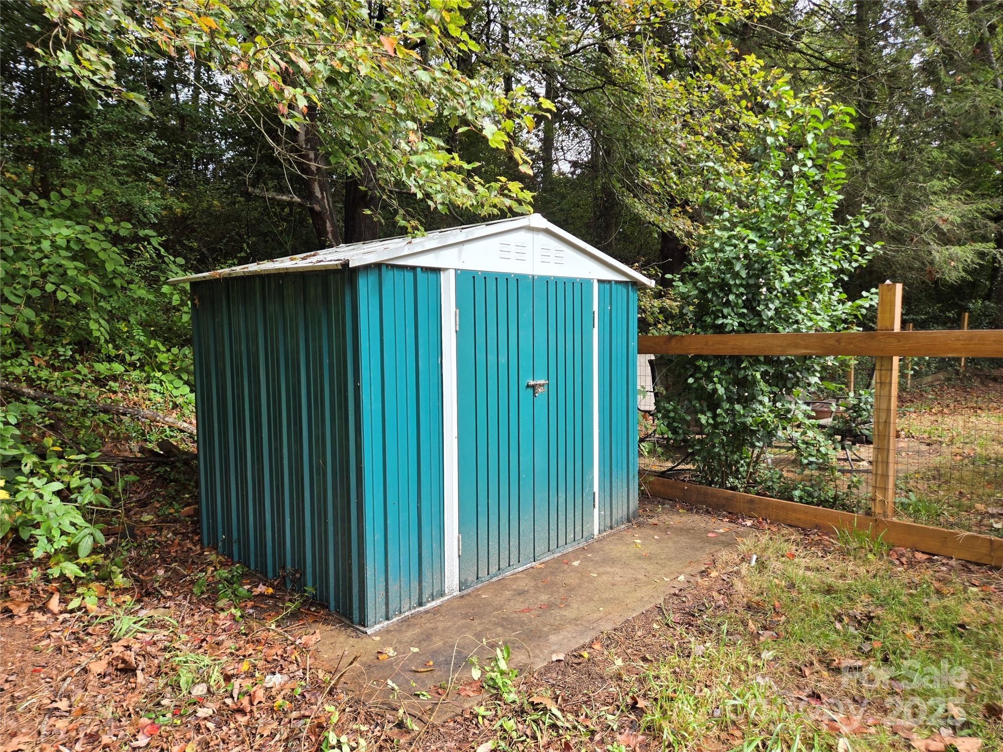 148 Huffman Road Clyde, NC 28721 - Photo 45 of 46 a backyard of a house with lots of green space