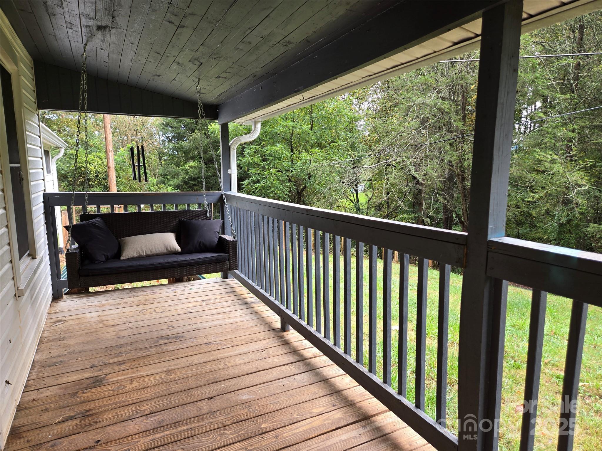 148 Huffman Road Clyde, NC 28721 - Photo 7 of 46 a view of roof deck with patio