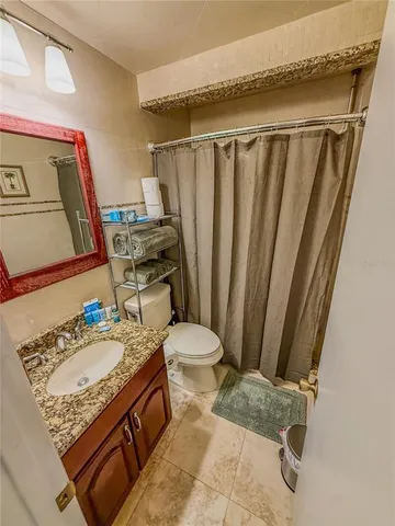 a kitchen that has a stove and a sink