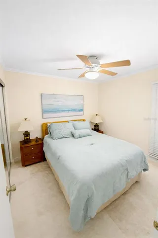 a bedroom with a bed and a cabinets