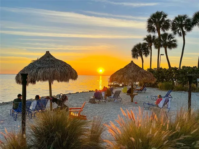 a view of a backyard of a house with a mountain view