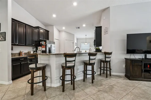 a bedroom with a bed and a walk in closet