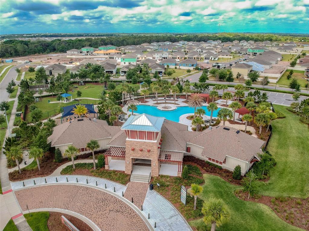 8439 Hunters Fork Loop Ruskin, FL 33573 - Photo 72 of 74 an aerial view of a house with a garden