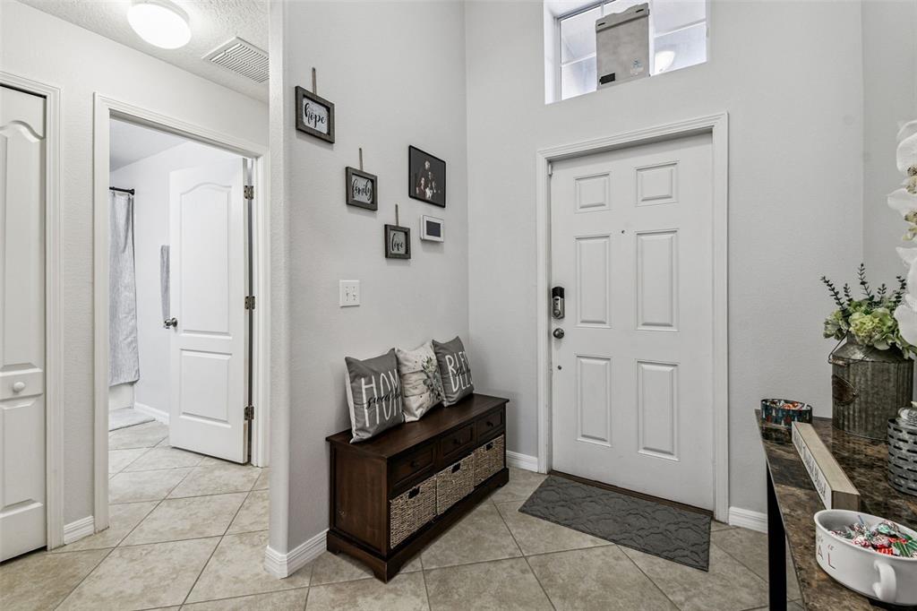 8439 Hunters Fork Loop Ruskin, FL 33573 - Photo 9 of 74 a view of room with furniture and wooden floor