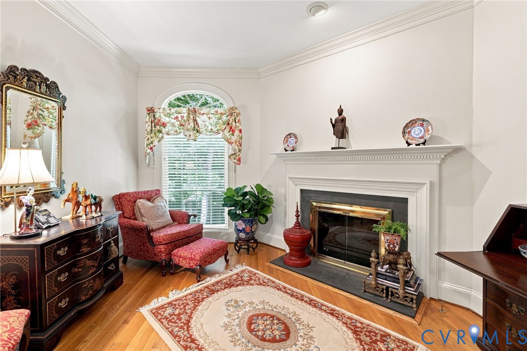 3950 Reeds Landing Circle Midlothian, VA 23113 - Photo 10 of 49 Fireplace with a decorative mantel, wood-finish fl