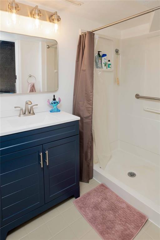 1005 Paintertown Road Irwin, PA 15642 - Photo 11 of 33 a bathroom with a sink vanity and a mirror