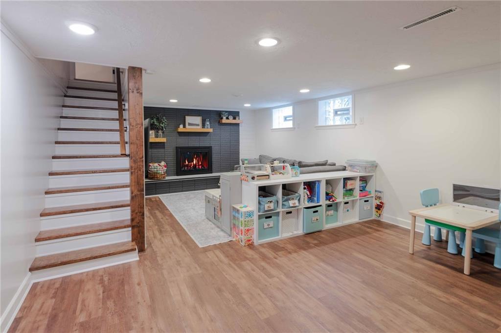 1005 Paintertown Road Irwin, PA 15642 - Photo 18 of 33 a living room with furniture and a wooden floor