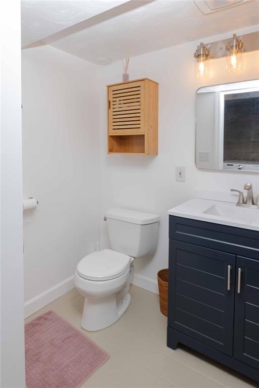 1005 Paintertown Road Irwin, PA 15642 - Photo 22 of 33 a bathroom with a sink mirror and toilet