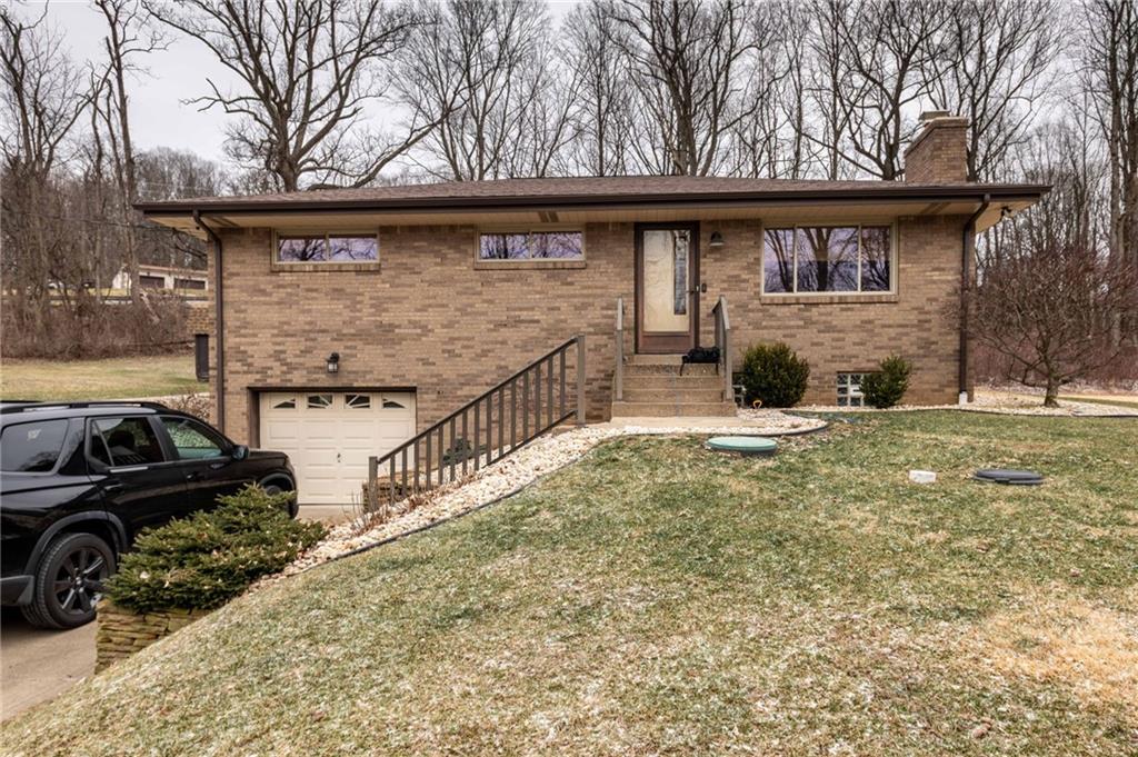1005 Paintertown Road Irwin, PA 15642 - Photo 26 of 33 a view of a car park in front of a house