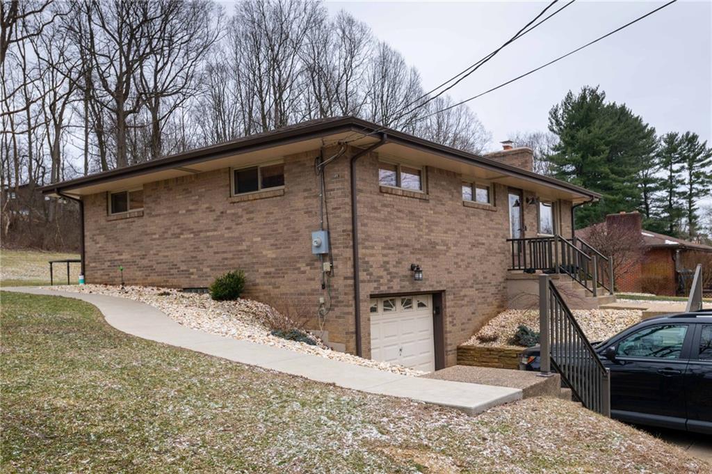 1005 Paintertown Road Irwin, PA 15642 - Photo 27 of 33 a backyard of a house with seating space