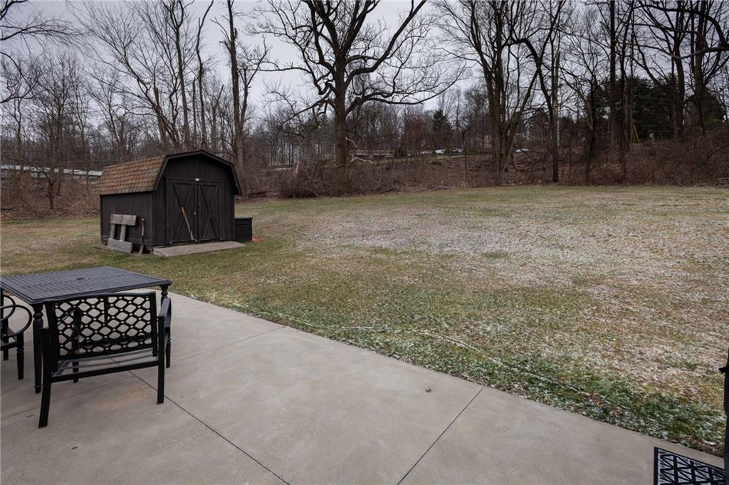 1005 Paintertown Road Irwin, PA 15642 - Photo 32 of 33 a view of a bench in backyard of house