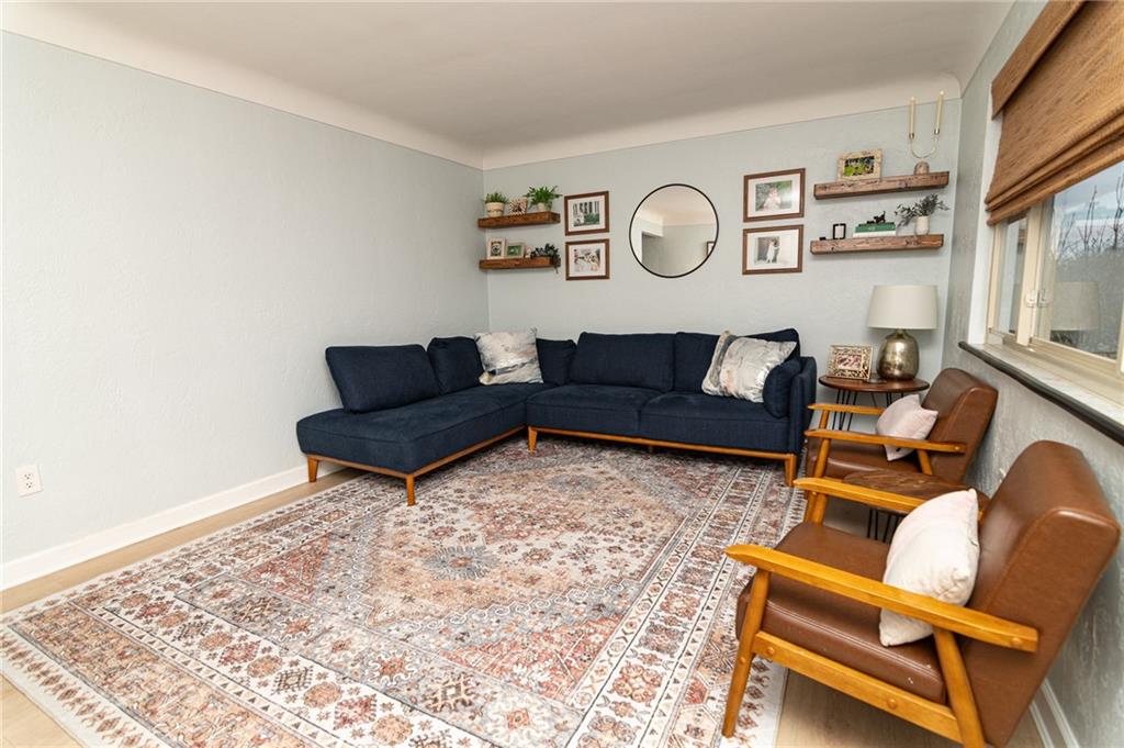 1005 Paintertown Road Irwin, PA 15642 - Photo 6 of 33 a living room with furniture and a rug