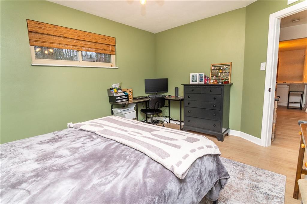 1005 Paintertown Road Irwin, PA 15642 - Photo 9 of 33 a bedroom with a bed and a table in it