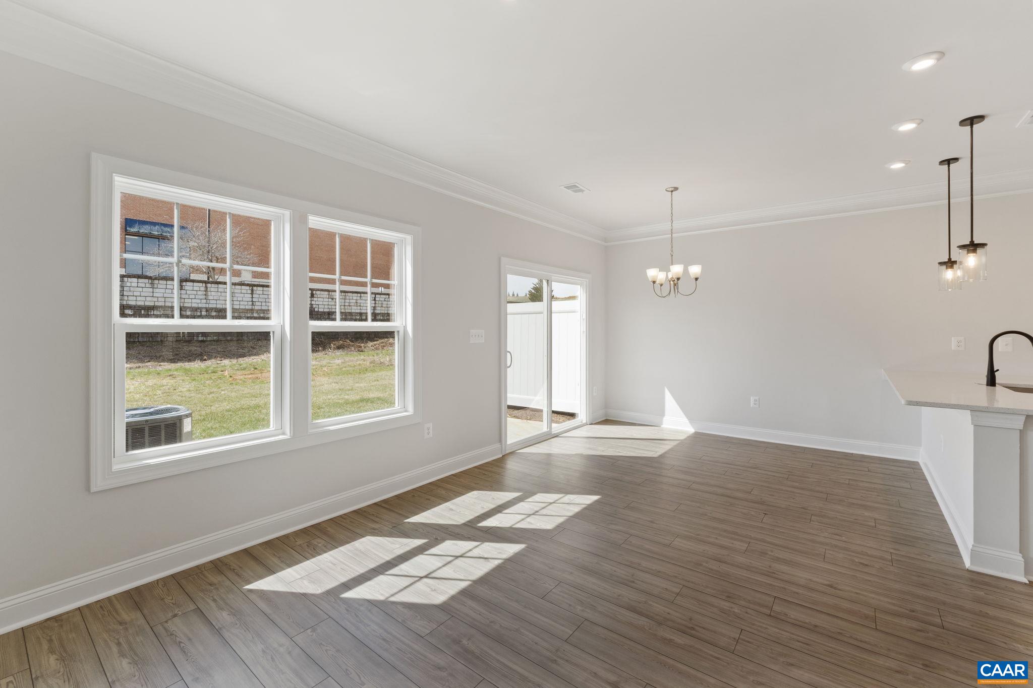 313 Ridgeline Drive Waynesboro, VA 22980 - Photo 13 of 34 a view of an empty room with a window and wooden floor