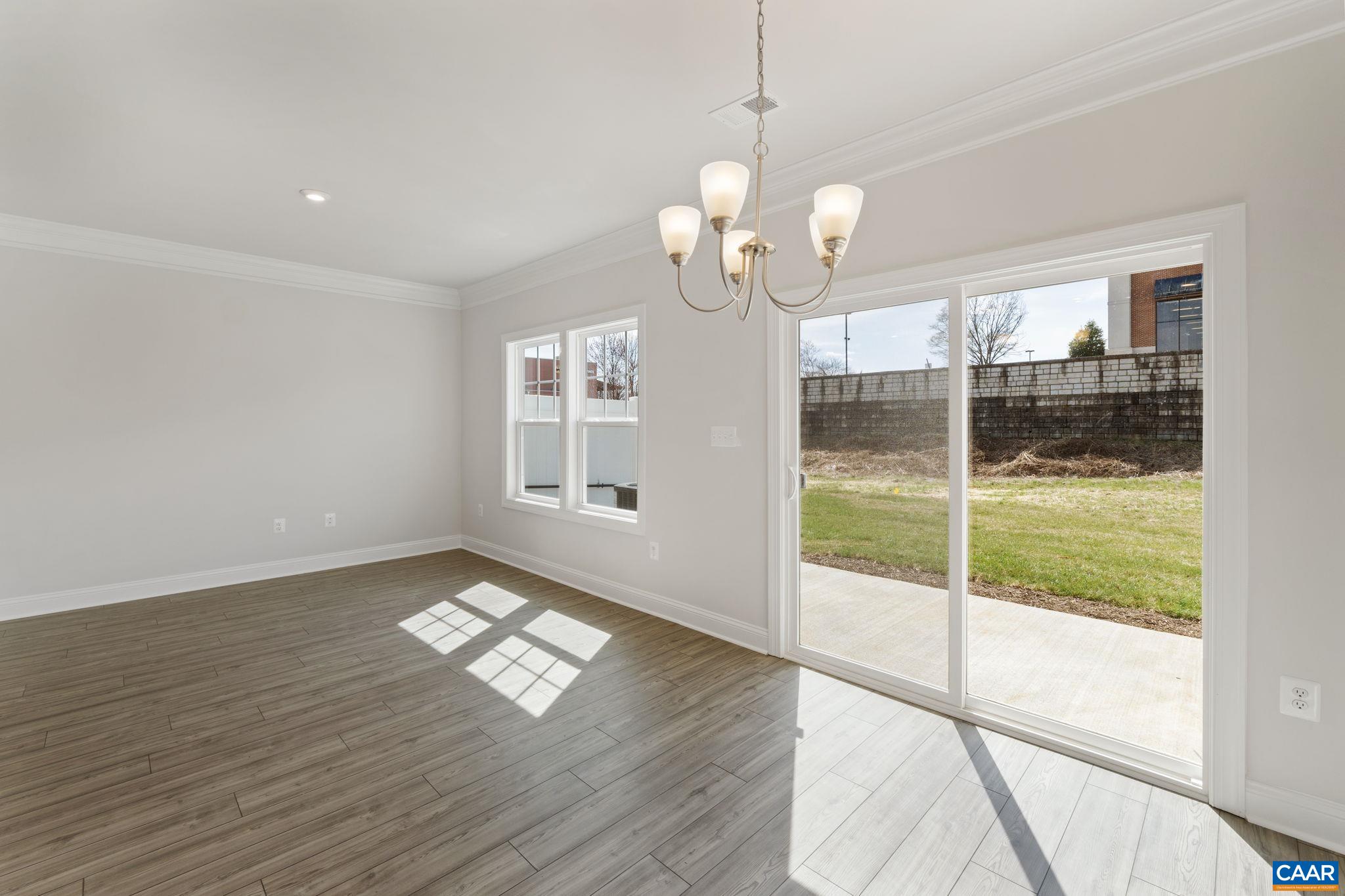313 Ridgeline Drive Waynesboro, VA 22980 - Photo 18 of 34 a view of an empty room with wooden floor and a window
